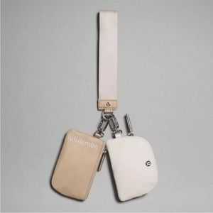 LULULEMON Dual Pouch Wristlet in trench &
white opal